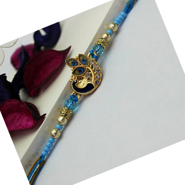 Jack and Rex Peacock Rakhi for Brother – Blue CZ Stone Beaded Raksha Bandhan Thread with Enamel Detailing Jack and Rex Peacock Rakhi for Brother – Blue CZ Stone Beaded Raksha Bandhan Thread with Enamel Detailing