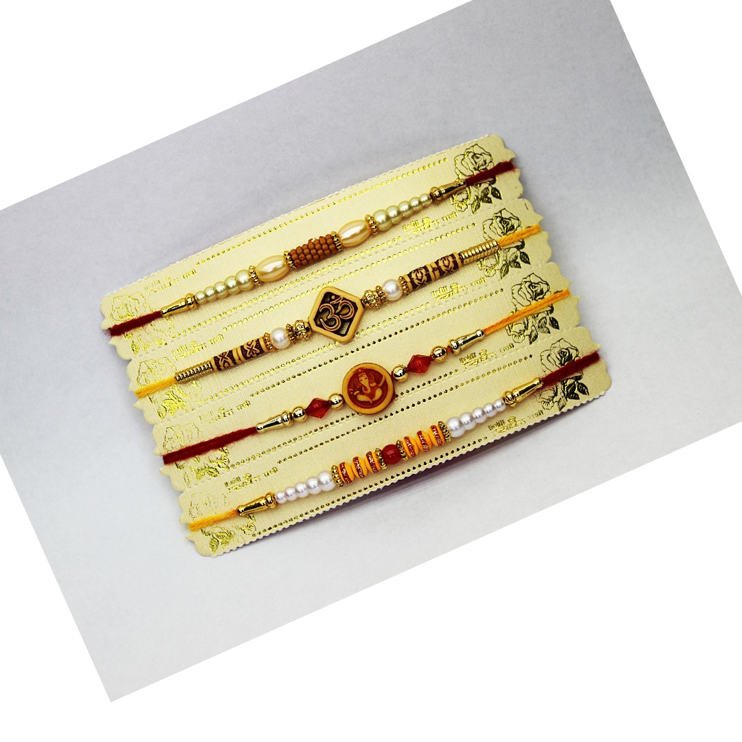 Untitled (24) Jack and Rex Traditional 4 Rakhi Combo Set – Om, Ganesha, Rudraksh & Pearl Rakhi Threads for Brother